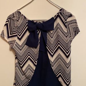 Top with bow on back
